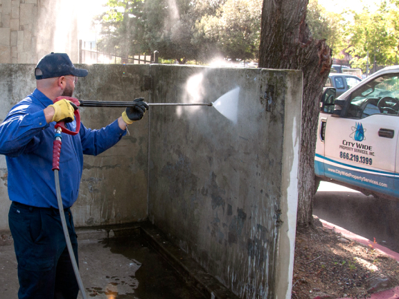 Close-up of pressure washing hose 