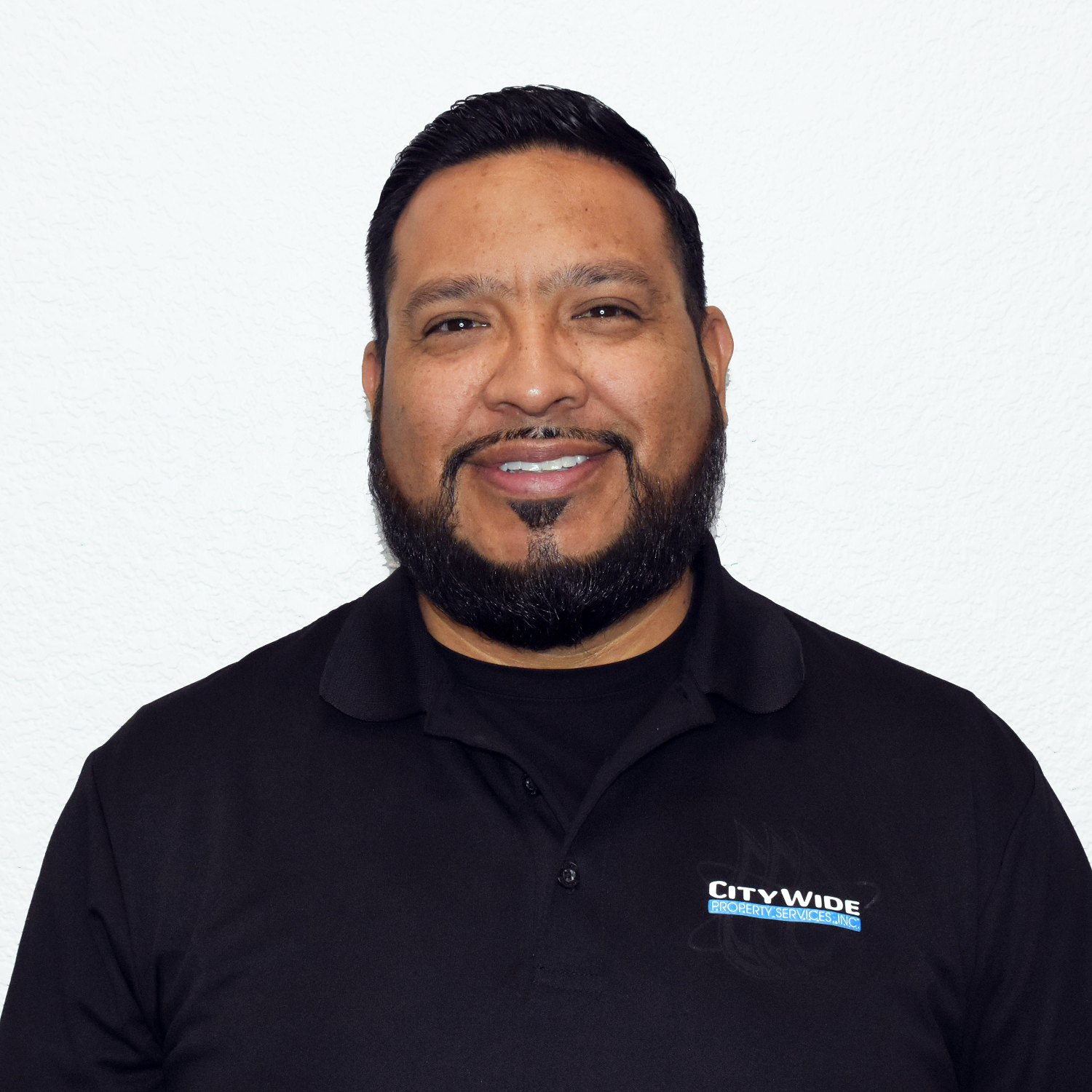 Photo of Roger Torres in a City Wide shirt